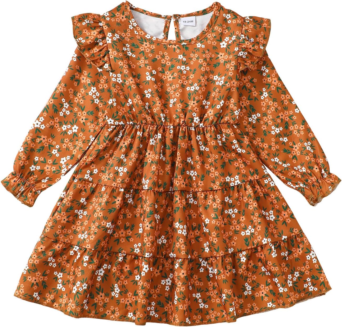 Toddler girl wearing the floral boho dress in a park setting